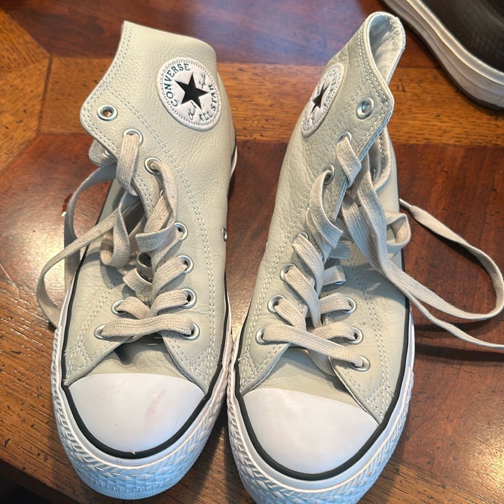 Gray leather high top converse